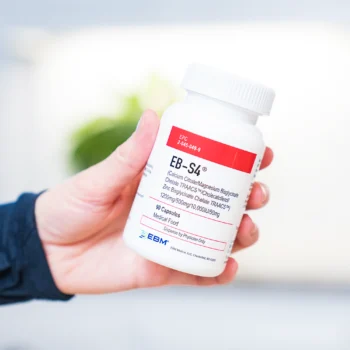 hand holding EB-S4 bottle